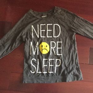 A long sleeve and sweater material shirt.